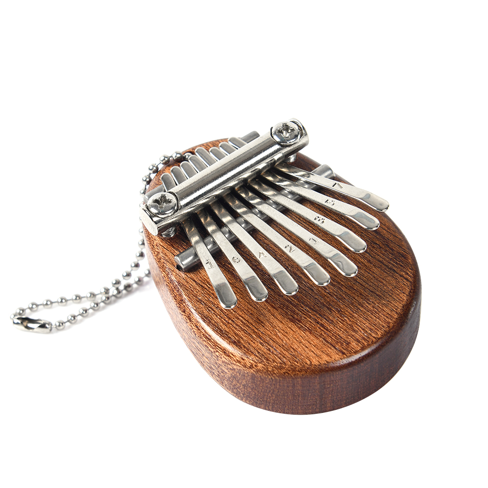 8 Key Mini Portable Thumb Pian - مراجعة Musical Instrument Percussion وسعره