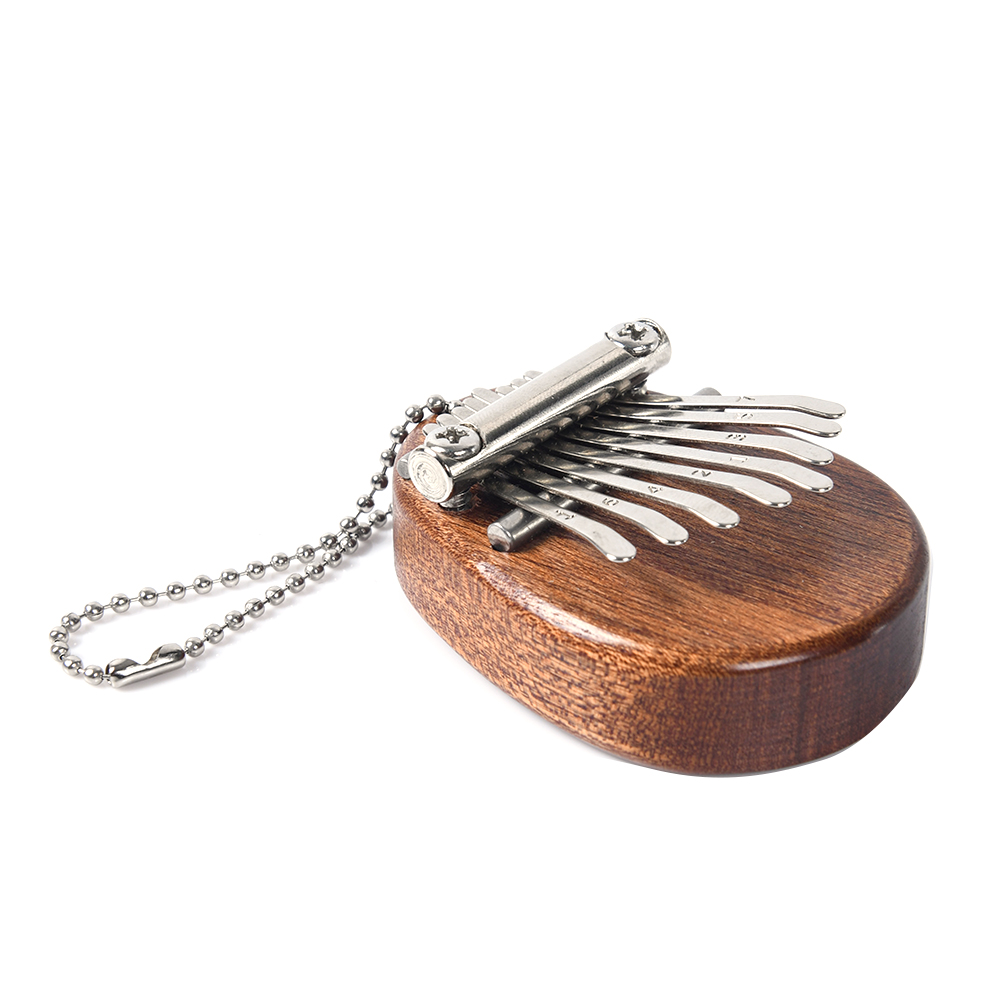 8 Key Mini Portable Thumb Pian - مراجعة Musical Instrument Percussion وسعره