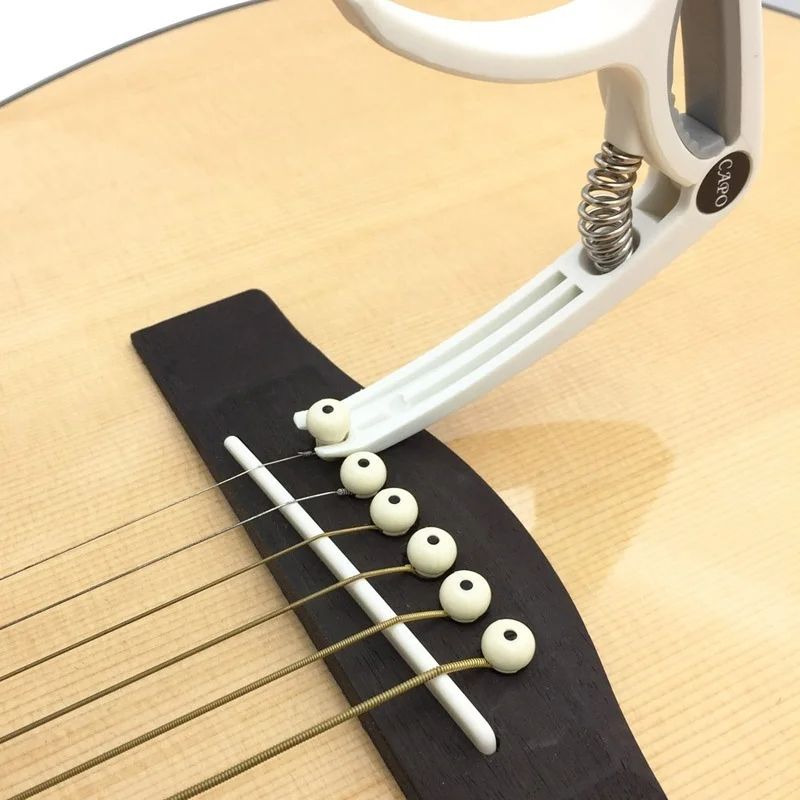 Plastic Guitar Capo for 6 Stri - مراجعة Classical Guitar Nylon وسعره