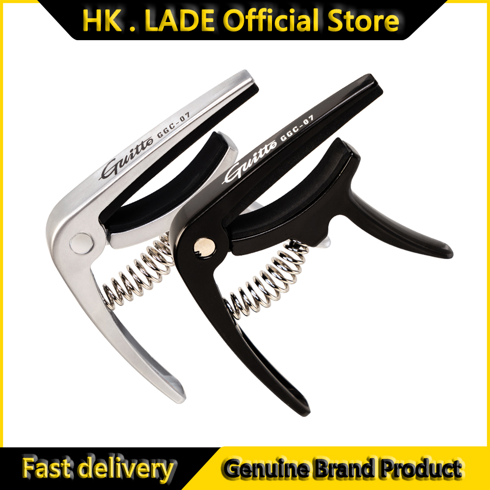 GUITTO GGC-07 Ukulele Capo Qui - مراجعة Musical Instrument In English وسعره